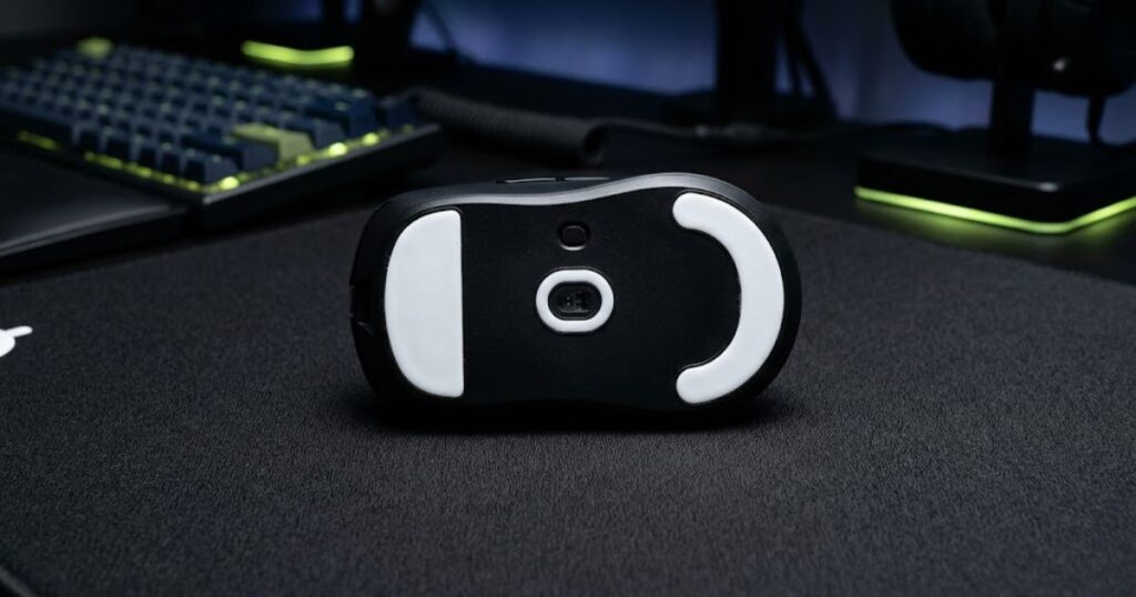 Underside of gaming mouse showing PTFE mouse skates for Valorant