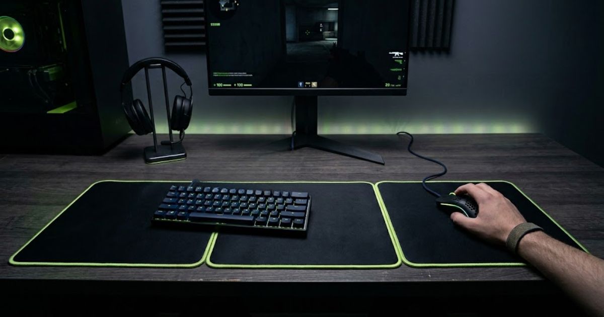 Three affordable gaming mouse pads arranged on a clean FPS gaming desk with a lightweight mouse and compact keyboard.
