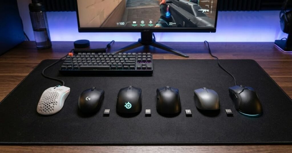 Several budget gaming mice displayed side by side on a gaming mouse pad for FPS gaming comparison.