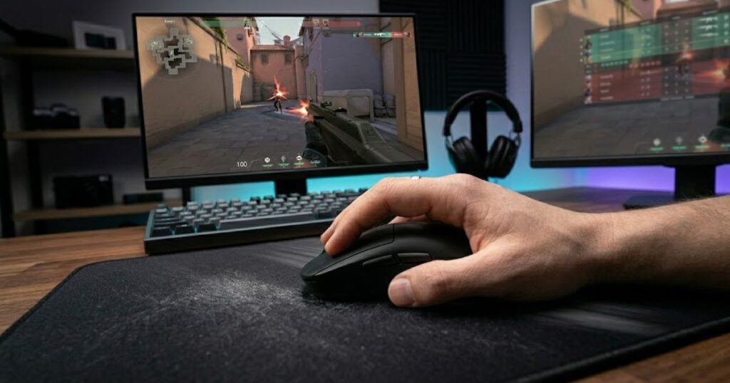 A player with large hands comfortably holding an ergonomic gaming mouse.