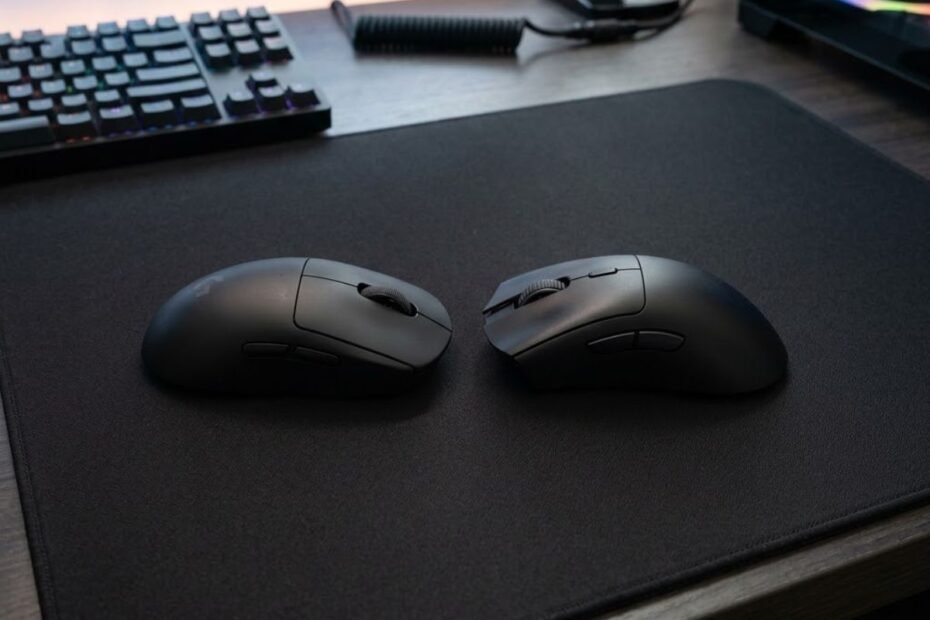 A side by side comparison showing a symmetrical gaming mouse and an ergonomic gaming mouse placed on a large black gaming mouse pad for FPS gaming