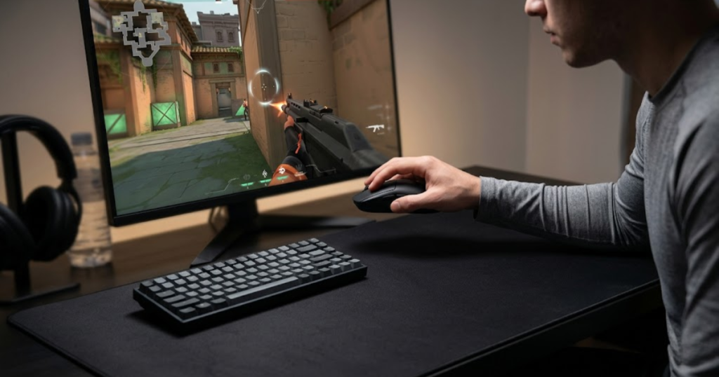 An FPS player lifting a gaming mouse to reposition on a large mouse pad during gameplay