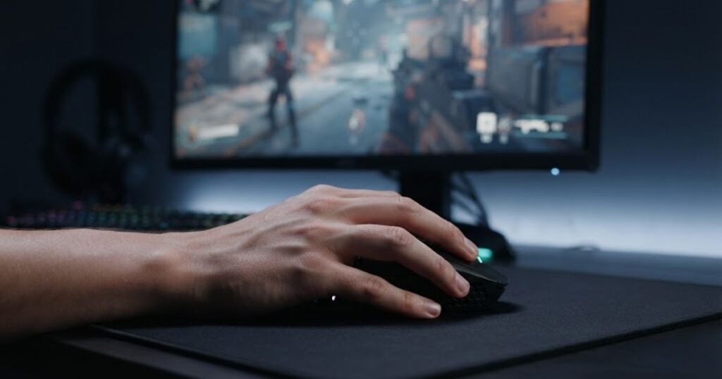 An FPS player using a gaming mouse during a long gaming session with a focus on hand position.